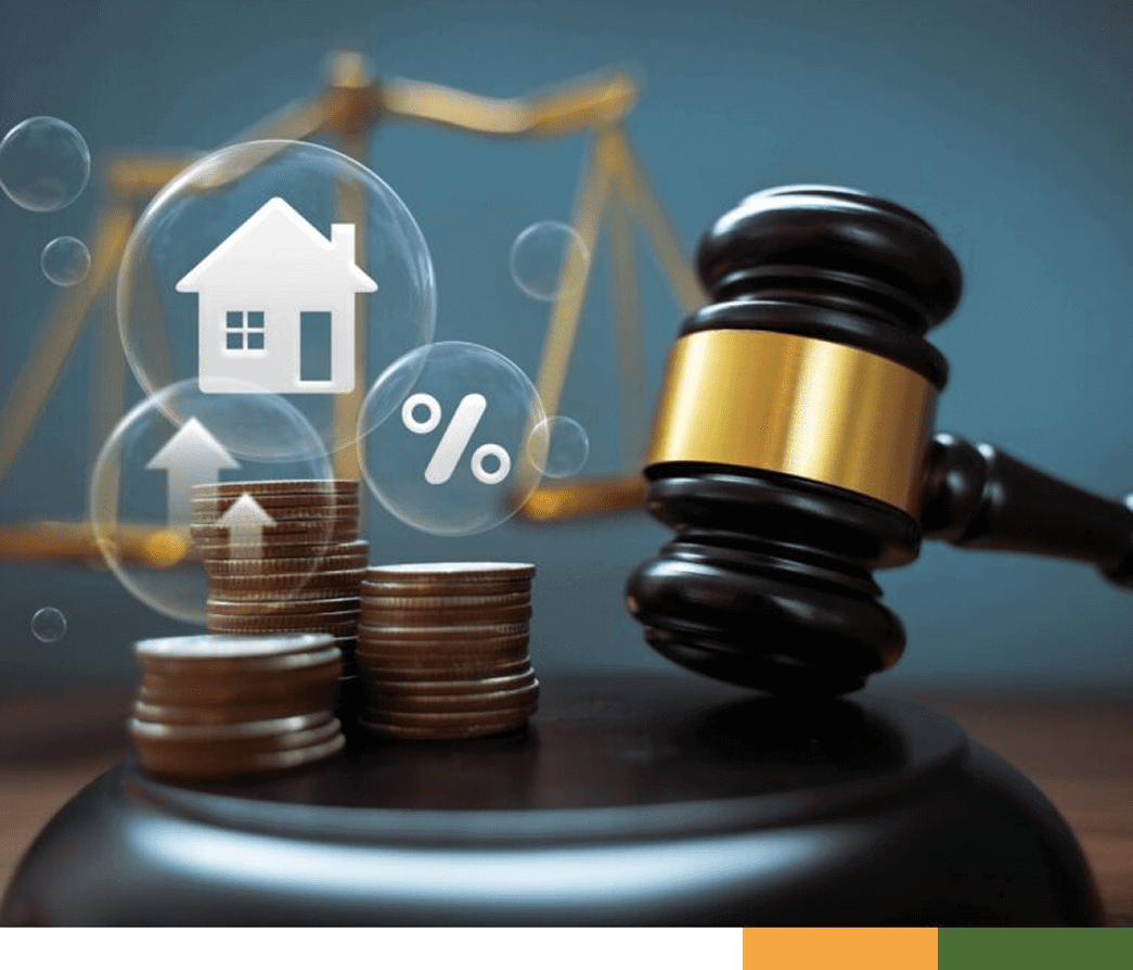 Gavel, house model, percentage sign, and coin stacks symbolizing real estate and mortgage law.